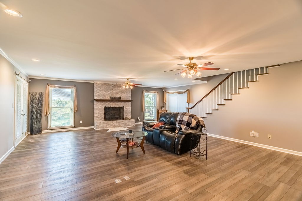 7135 Harmony Grove Road Crofton, KY 42217 - Photo 3 of 37 a living room with furniture and a fireplace