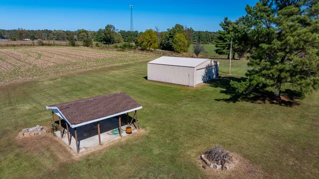 an aerial view of a house having big yard