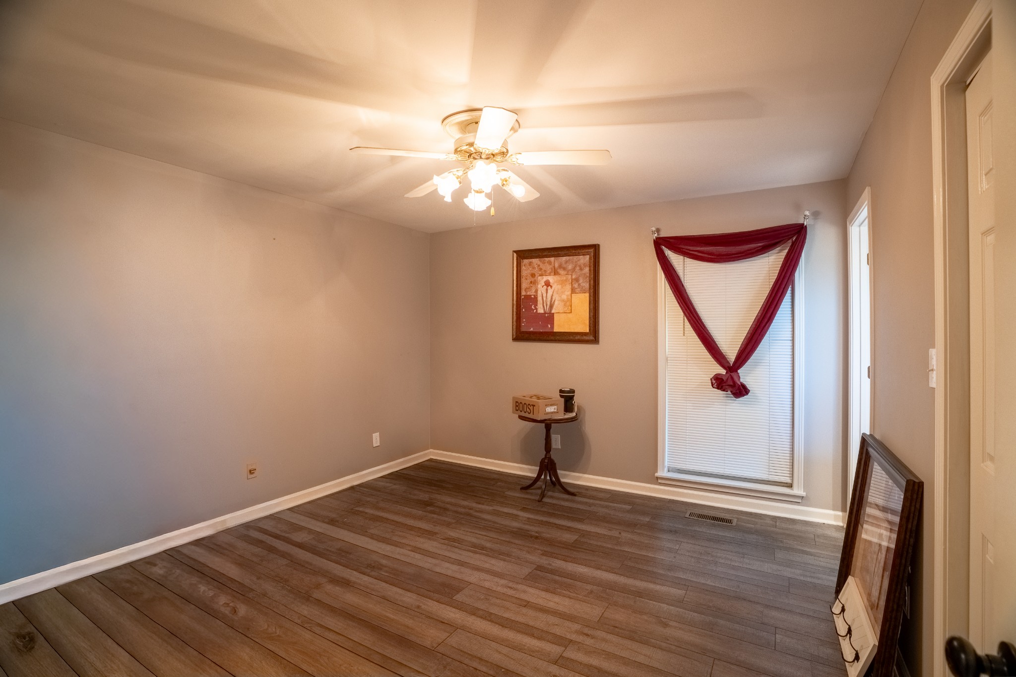7135 Harmony Grove Road Crofton, KY 42217 - Photo 8 of 37 a view of empty room with wooden floor