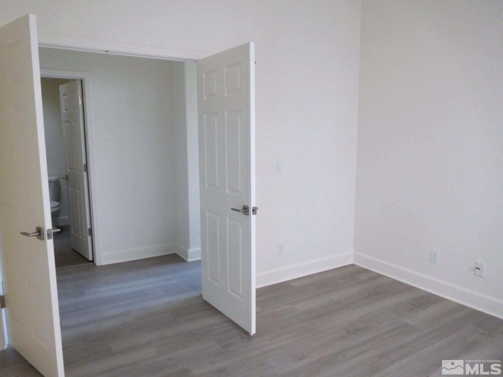 3463 Long Drive Minden, NV 89423 - Photo 18 of 36 a view of a room with wooden floor