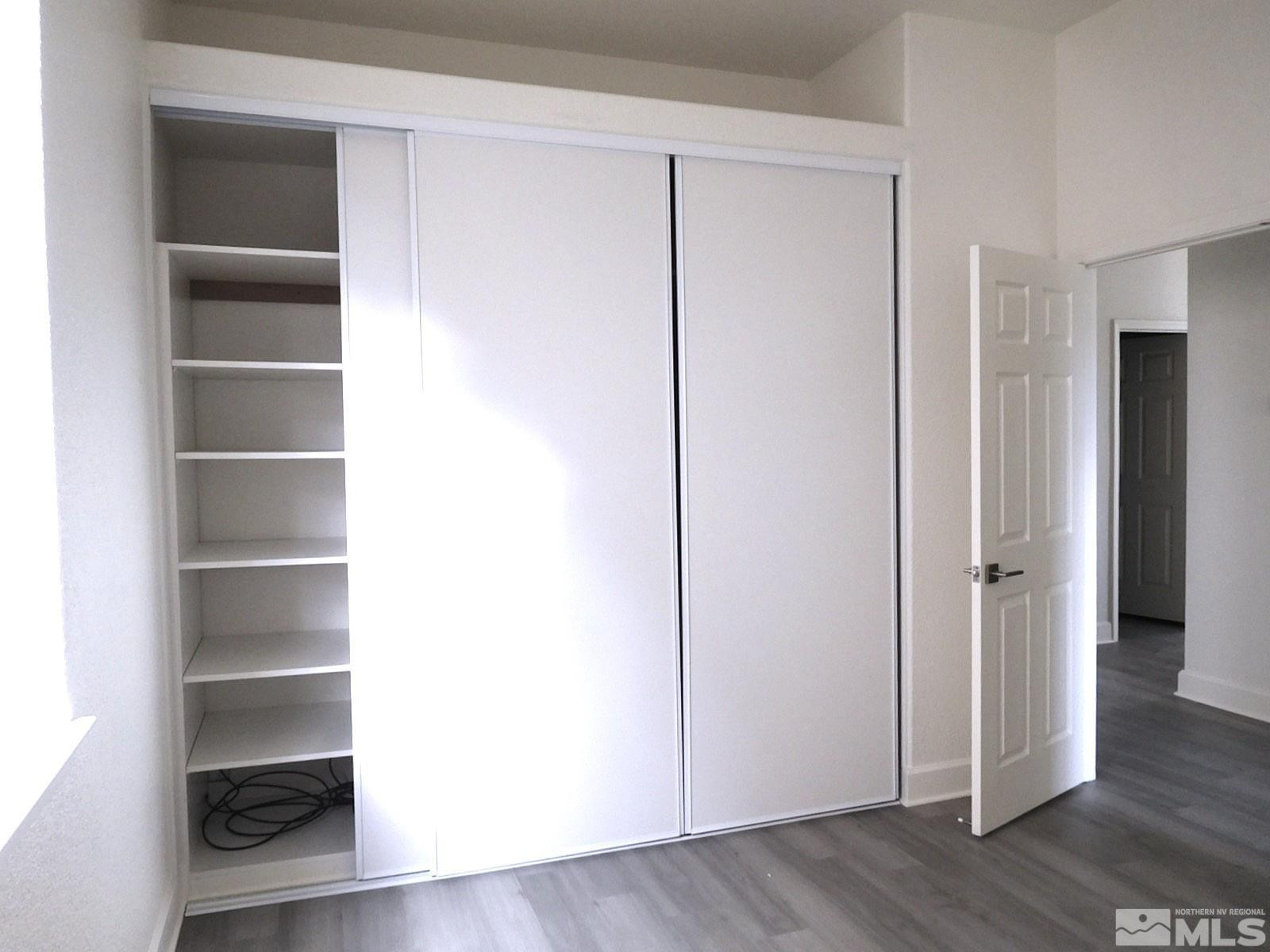 3463 Long Drive Minden, NV 89423 - Photo 19 of 36 a view of walk in closet with empty racks