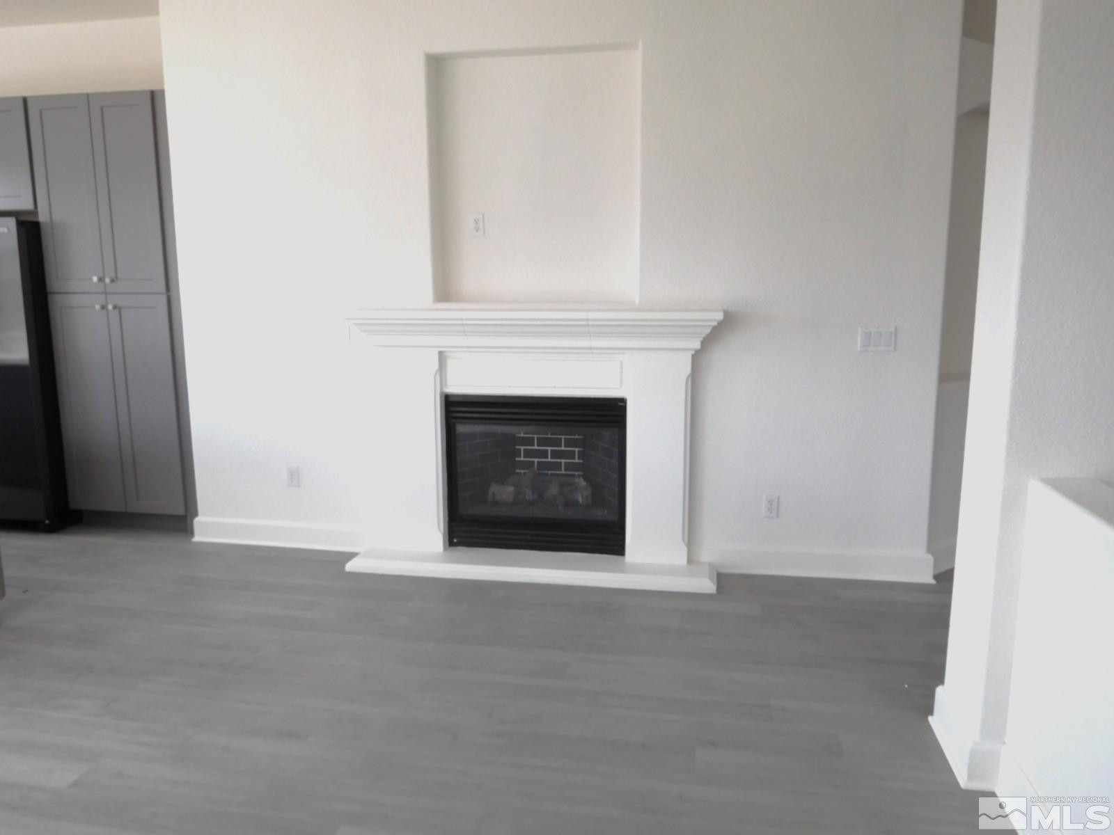 3463 Long Drive Minden, NV 89423 - Photo 4 of 36 a view of an empty room with a fireplace