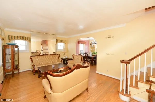 a view of a livingroom with furniture and a table