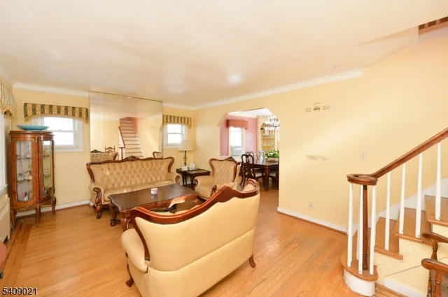 a view of a livingroom with furniture and a table