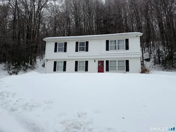 a house view with a outdoor space
