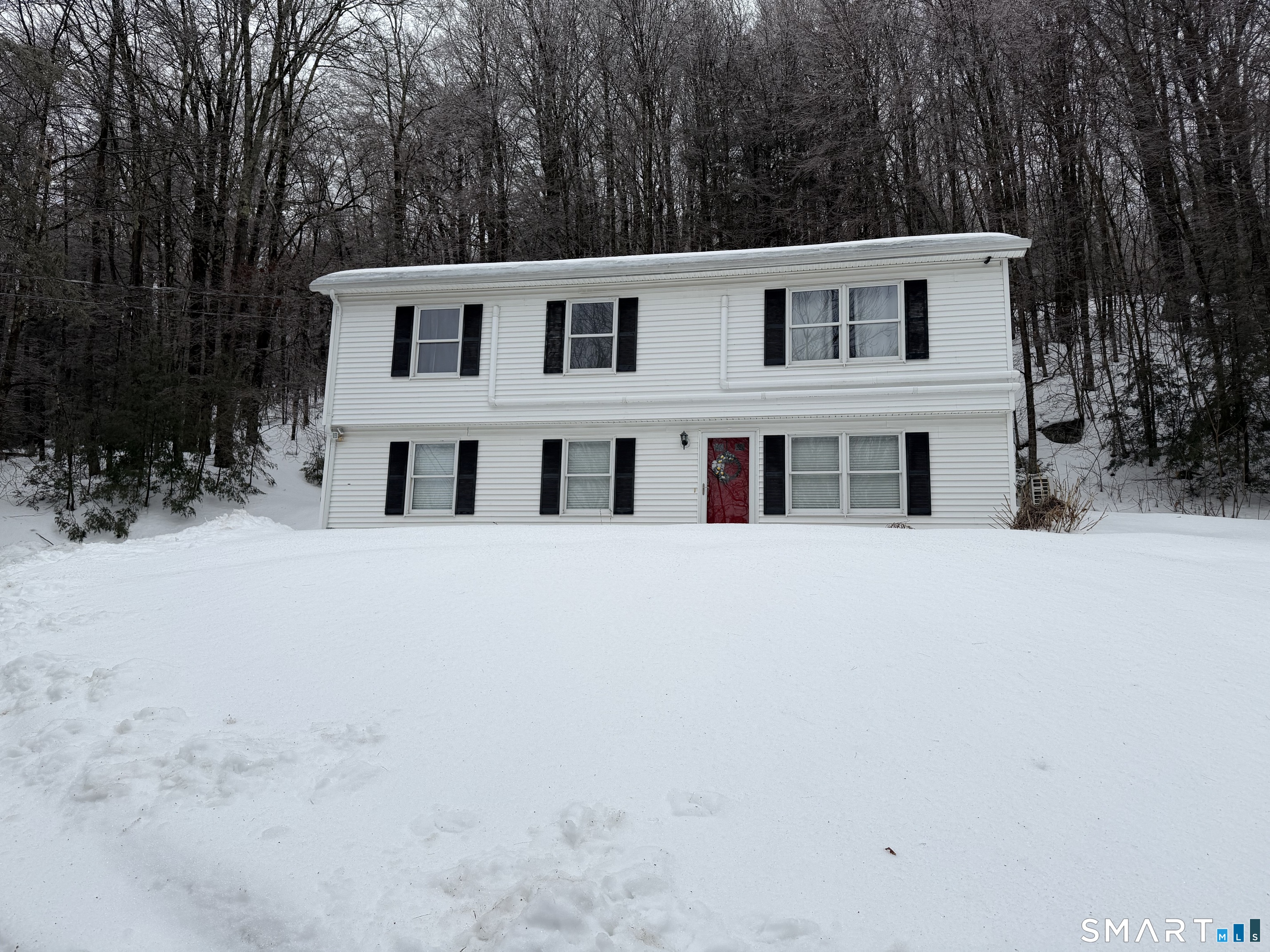 a house view with a outdoor space