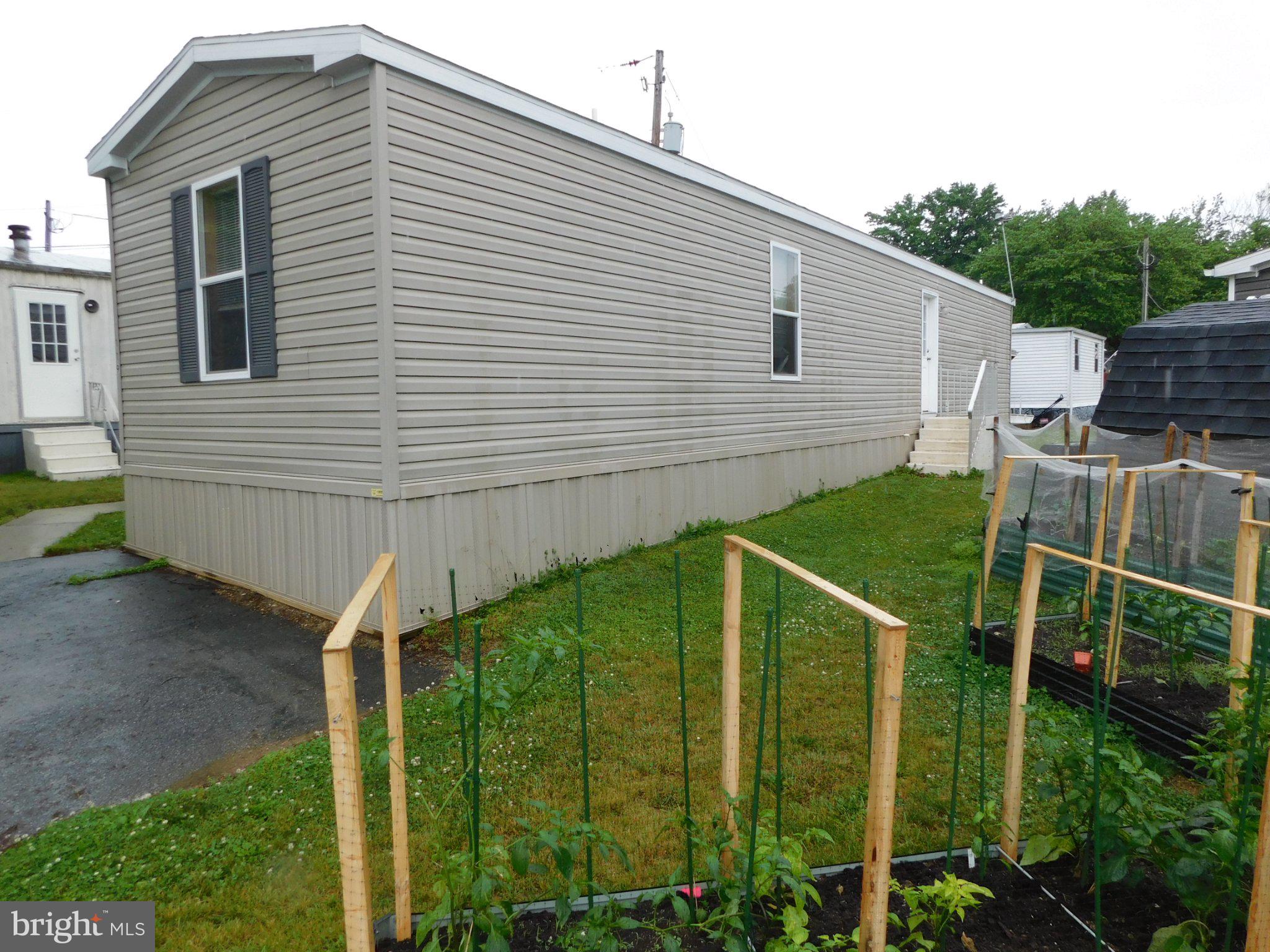 119 Meadow Lane Lititz, PA 17543 - Photo 2 of 13 a view of a backyard with plants
