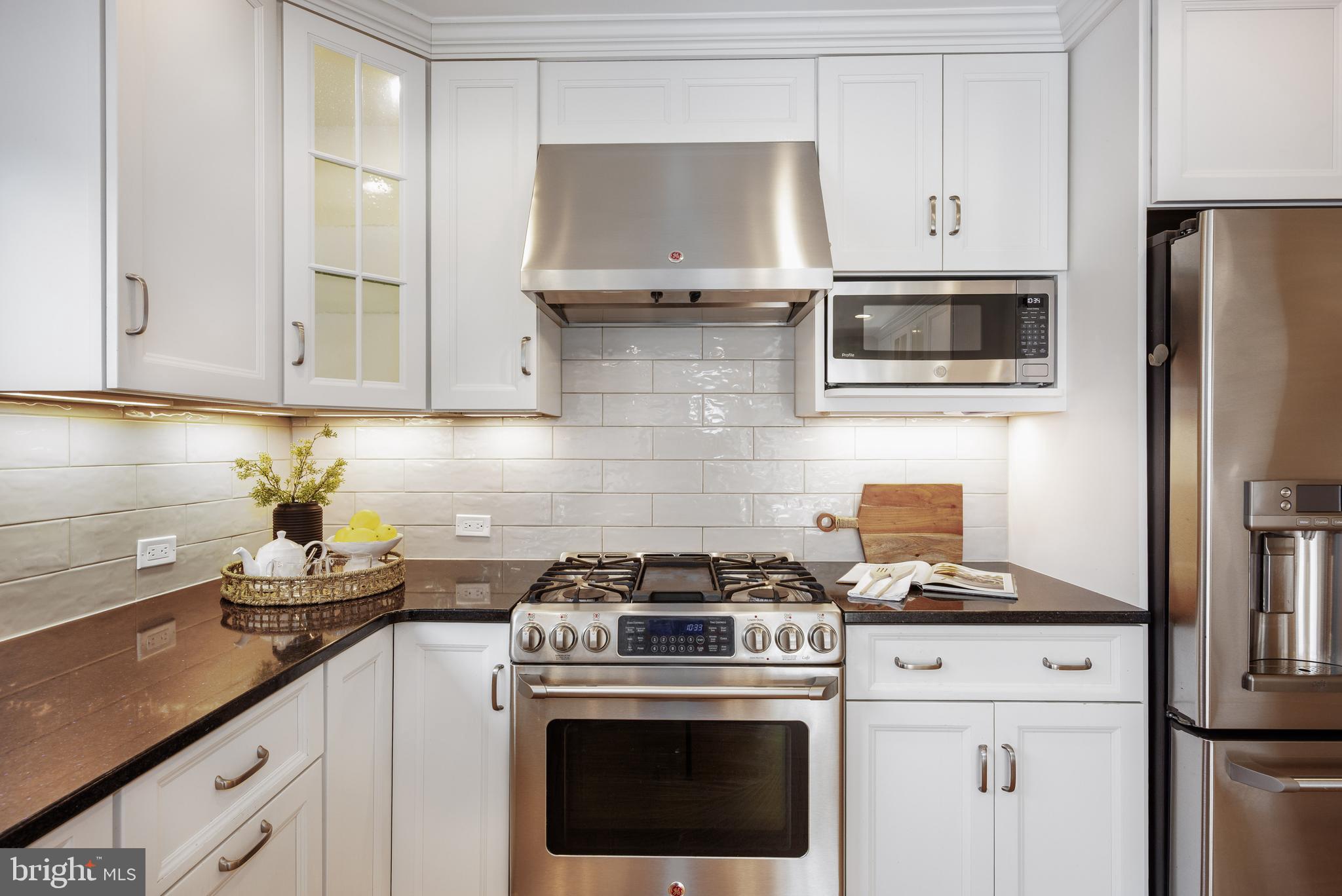 11908 Riding Loop Terrace North Potomac, MD 20878 - Photo 13 of 48 Sleek white cabinetry (2017)