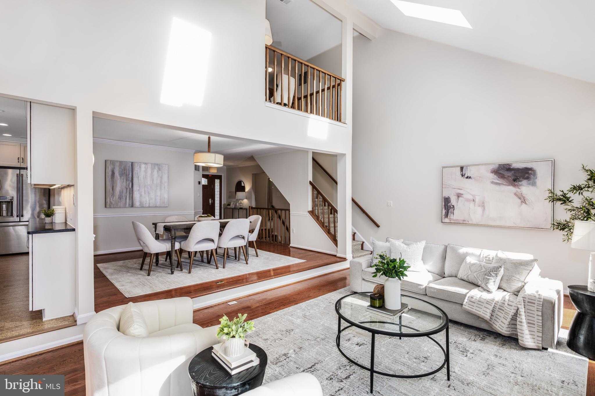 11908 Riding Loop Terrace North Potomac, MD 20878 - Photo 2 of 48 A soaring two-story Great Room w/ vaulted ceiling