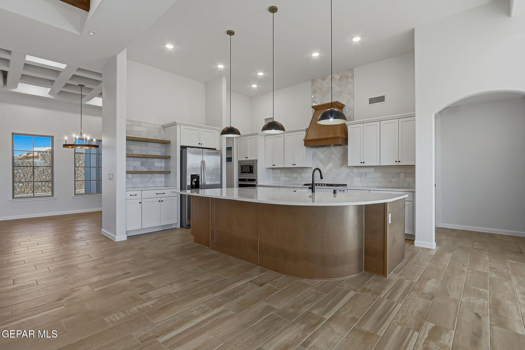 7416 Cimarron Rim Drive El Paso, TX 79911 - Photo 11 of 58 a view of kitchen with stainless steel appliances granite countertop a sink a counter space and cabinets