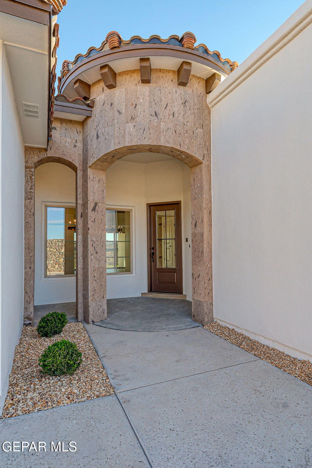 7416 Cimarron Rim Drive El Paso, TX 79911 - Photo 3 of 58 a view of a house with a porch