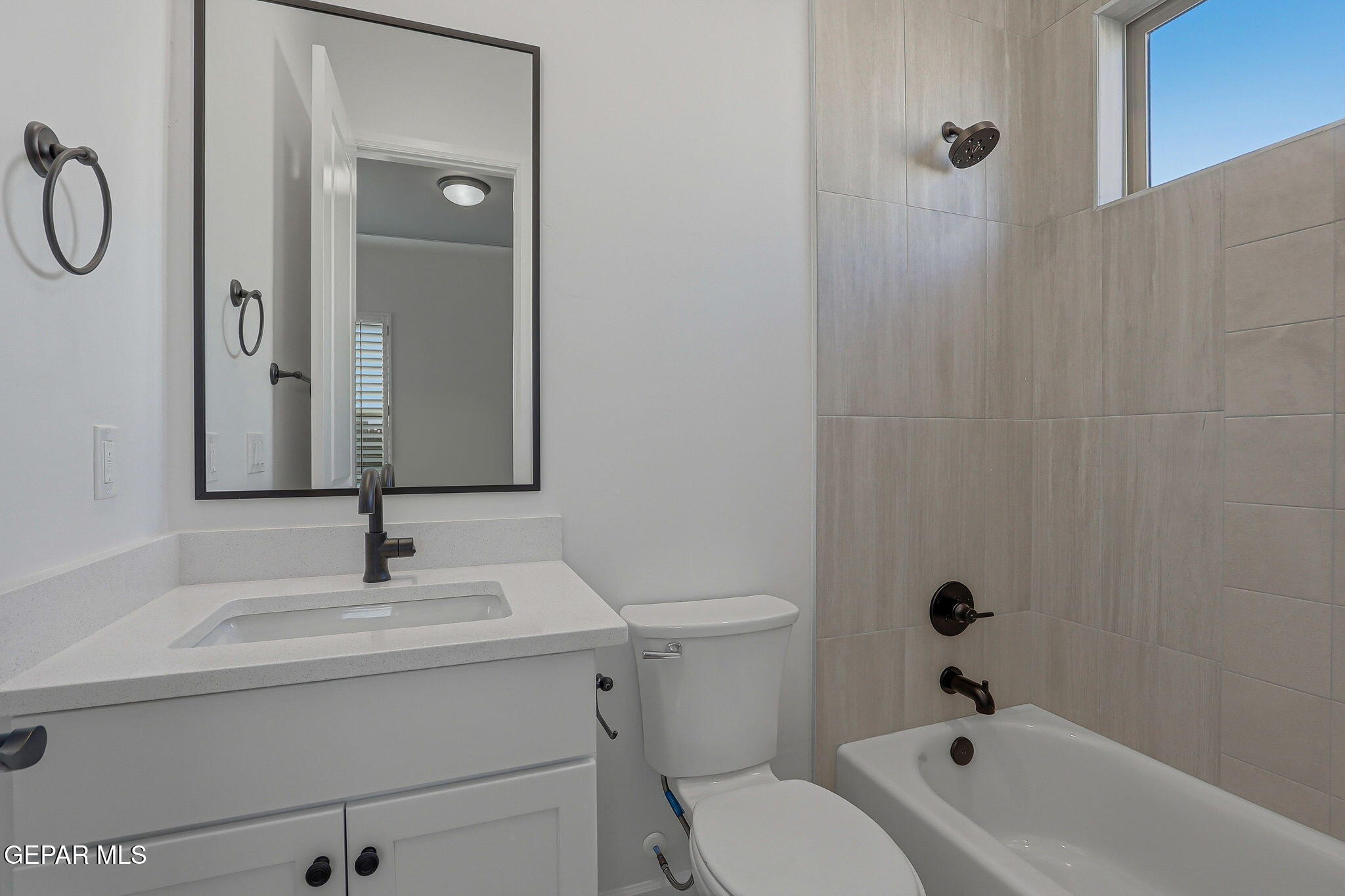 7416 Cimarron Rim Drive El Paso, TX 79911 - Photo 40 of 58 a bathroom with a sink a toilet and shower