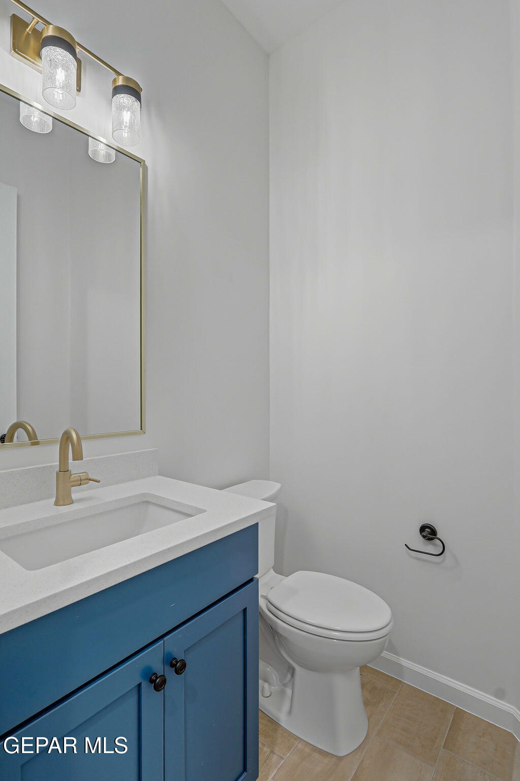 7416 Cimarron Rim Drive El Paso, TX 79911 - Photo 42 of 58 a bathroom with a sink a toilet and mirror