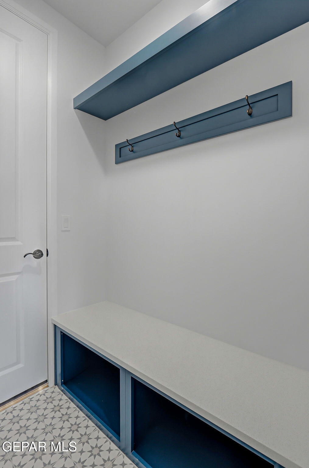 7416 Cimarron Rim Drive El Paso, TX 79911 - Photo 44 of 58 a room with a shelf