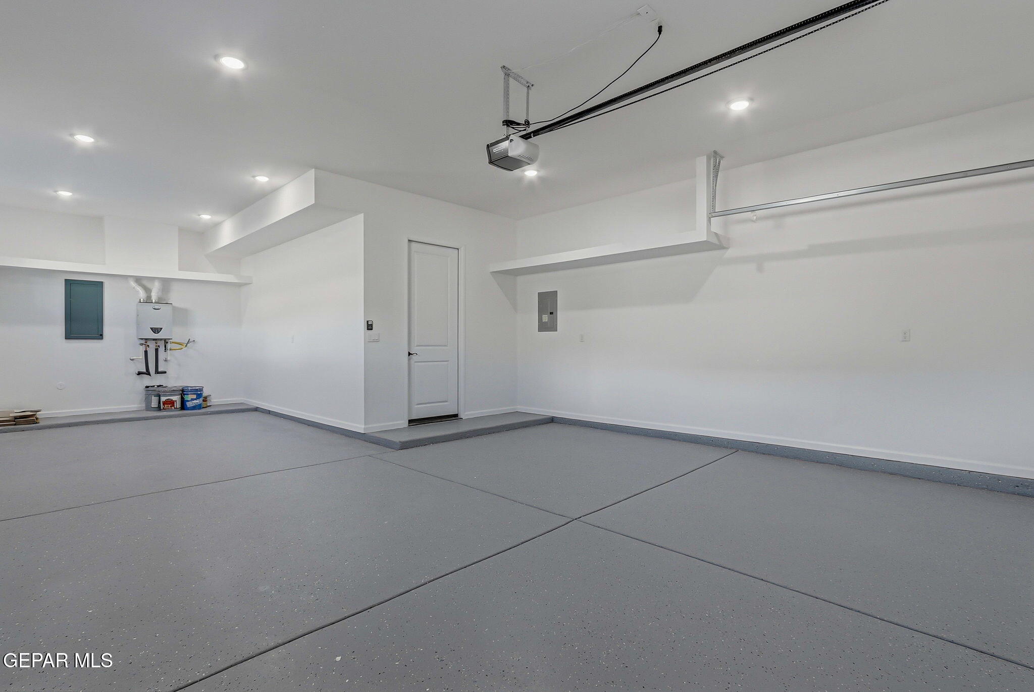 7416 Cimarron Rim Drive El Paso, TX 79911 - Photo 49 of 58 a view of a livingroom with furniture and refrigerator