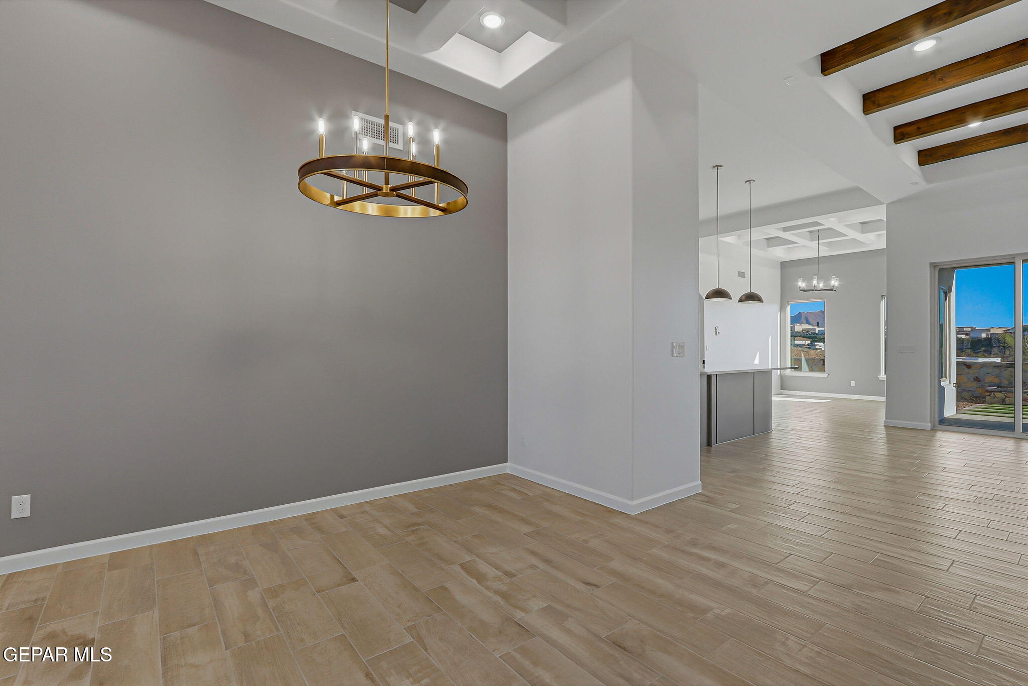 7416 Cimarron Rim Drive El Paso, TX 79911 - Photo 8 of 58 a view of an empty room with wooden floor