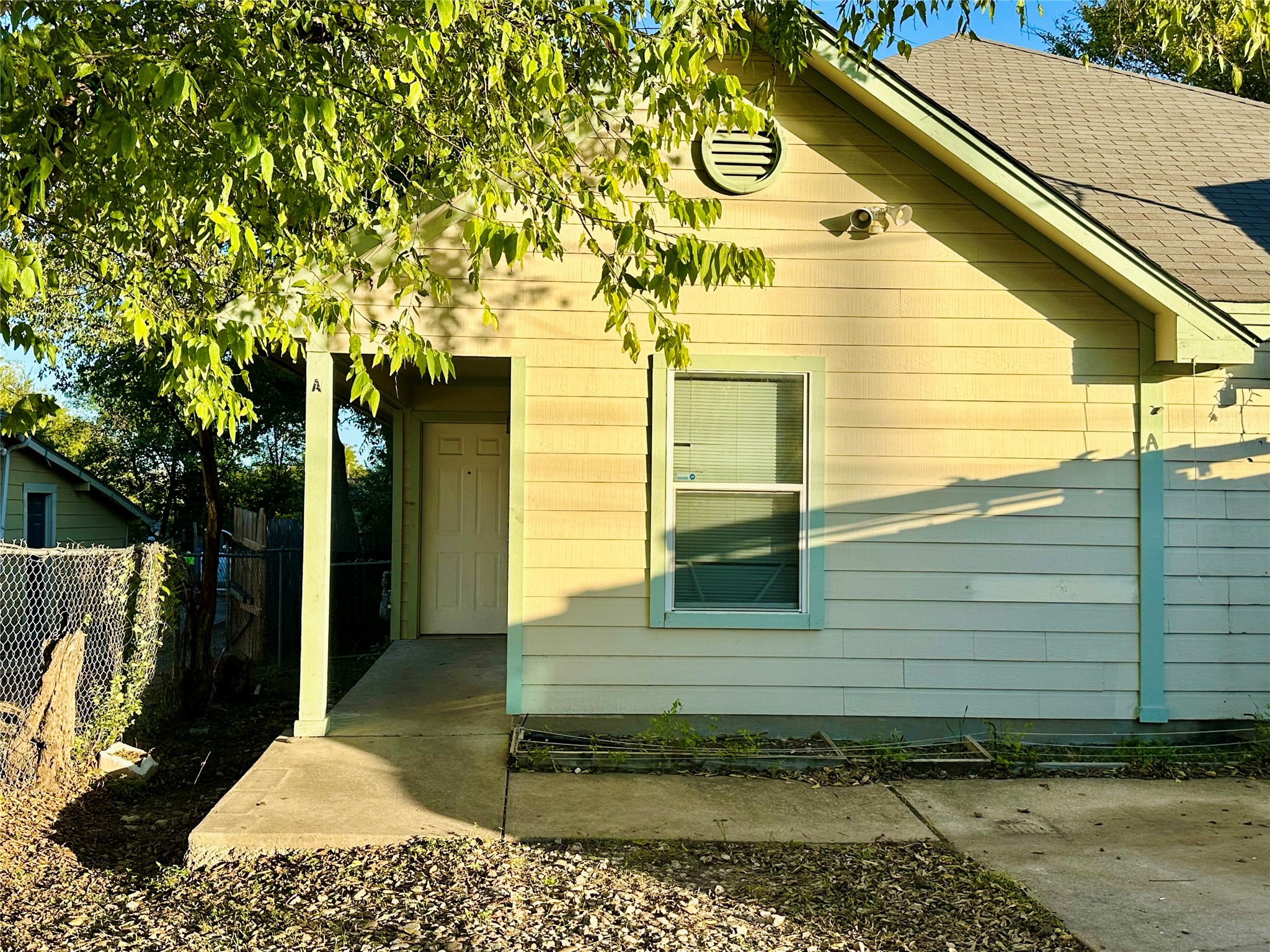 View of home's exterior featuring a shingled roof