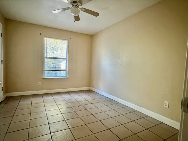 a view of an empty room and window