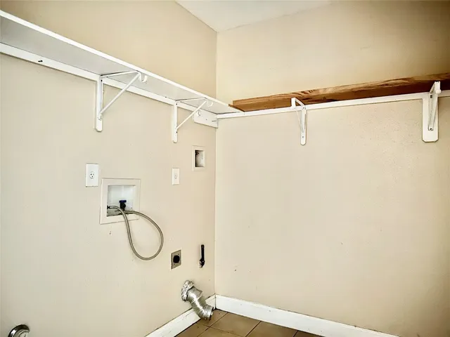 a bathroom with a shower and a mirror