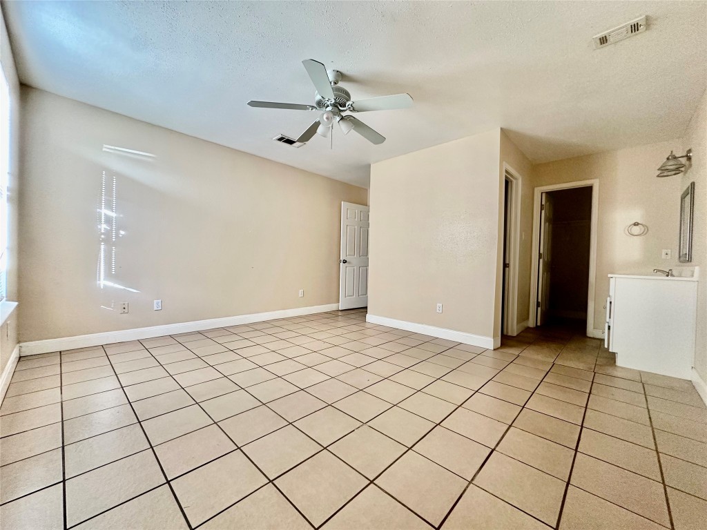 Undisclosed Address Austin, TX 78752 - Photo 8 of 15 a view of an empty room and window