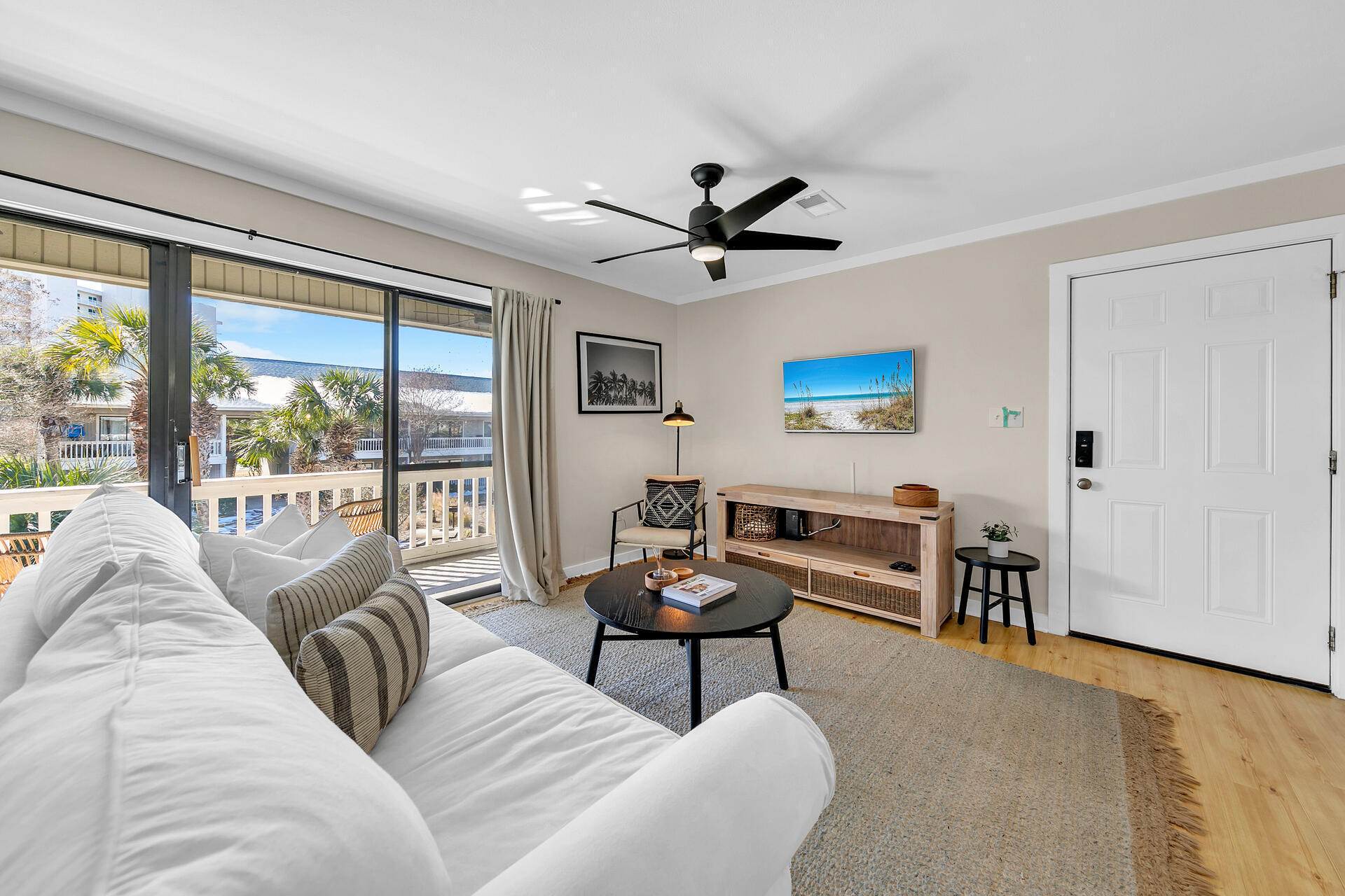 3799 East County Highway 30A, Unit H6 Santa Rosa Beach, FL 32459 - Photo 24 of 40 a living room with furniture and a large window