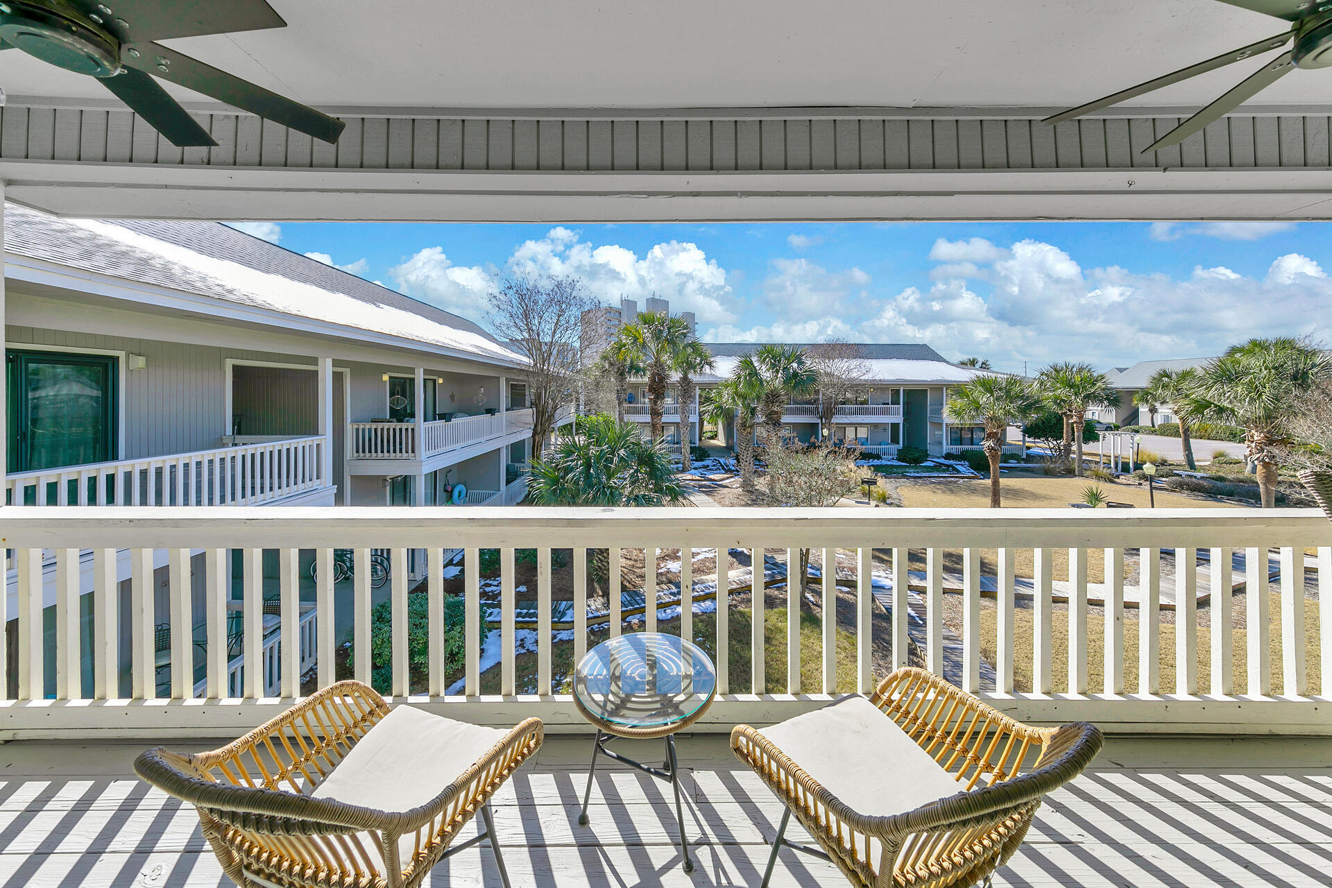 3799 East County Highway 30A, Unit H6 Santa Rosa Beach, FL 32459 - Photo 26 of 40 a view of a chairs and table on the roof deck