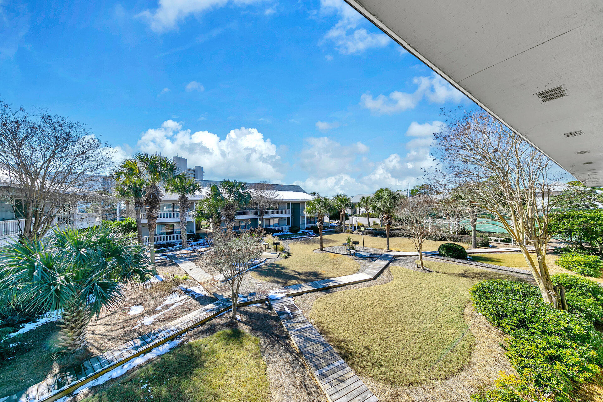 3799 East County Highway 30A, Unit H6 Santa Rosa Beach, FL 32459 - Photo 28 of 40 a swimming pool with outdoor seating and yard
