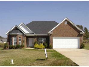 1607 Henry Smith Road Monroe, NC 28110 - Photo 1 of 1 a front view of a house with yard