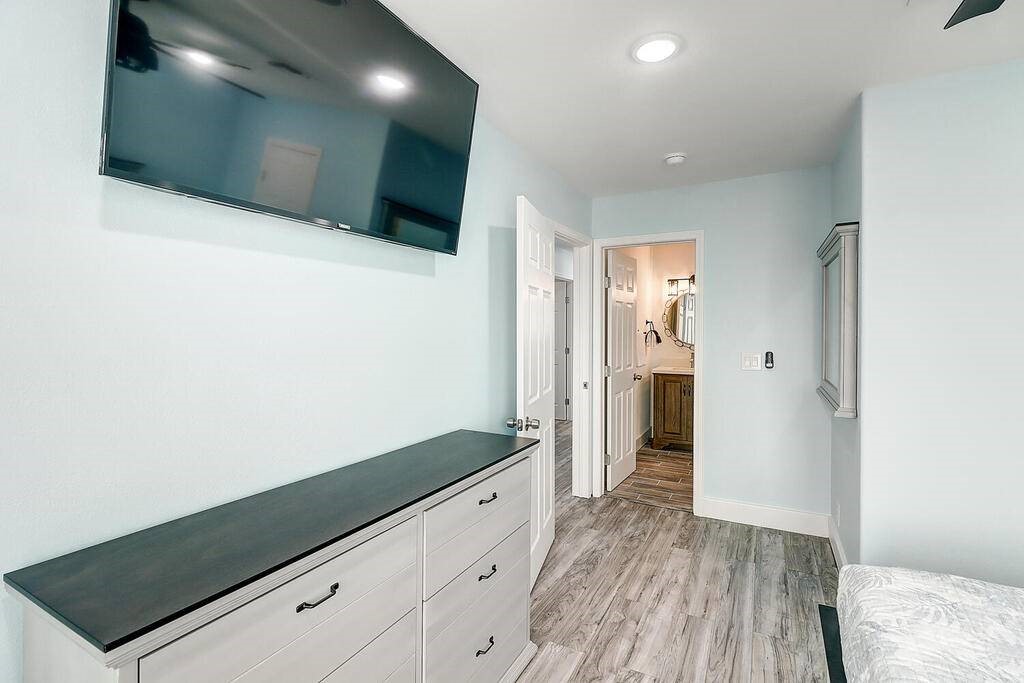2445 Laguna Shores Road Corpus Christi, TX 78418 - Photo 28 of 39 a view of hallway with wooden floor