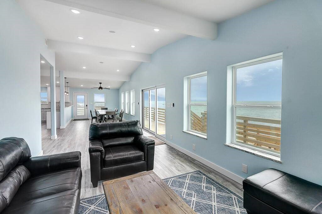 2445 Laguna Shores Road Corpus Christi, TX 78418 - Photo 7 of 39 a living room with furniture and a window