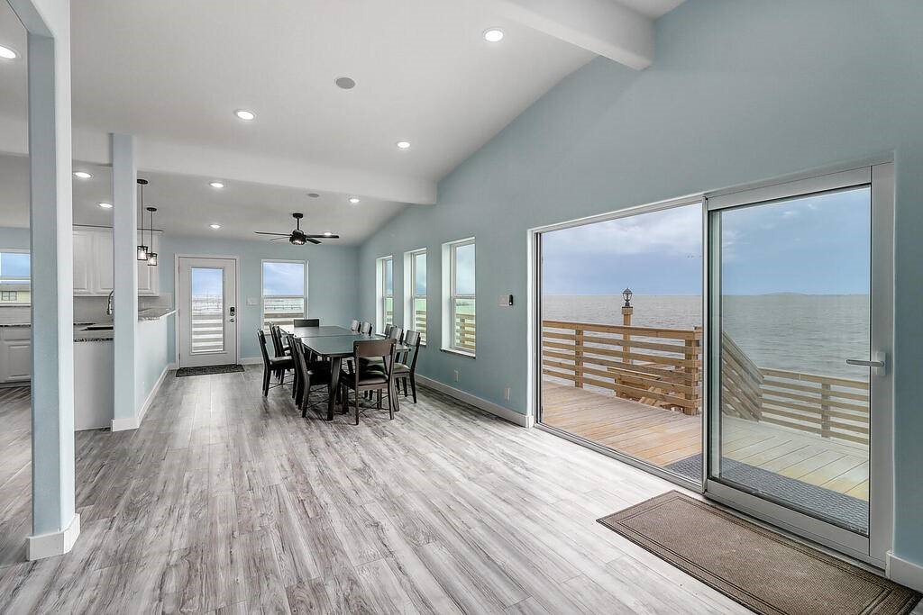 2445 Laguna Shores Road Corpus Christi, TX 78418 - Photo 8 of 39 a view of a living room and entry way to kitchen