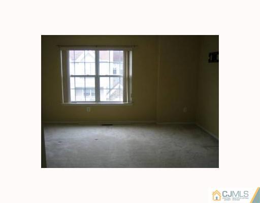 32 Inverness Drive Edison, NJ 08820 - Photo 7 of 9 a view of an empty room with a window