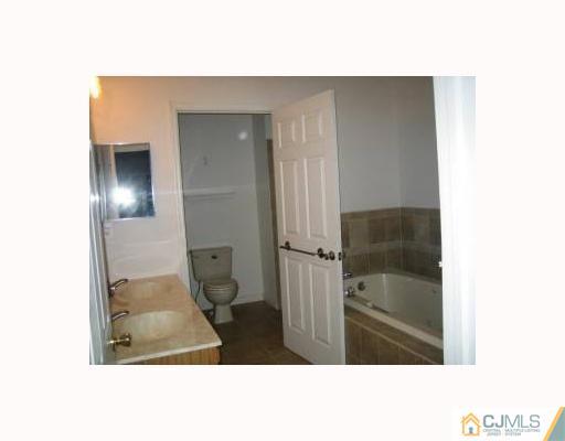 32 Inverness Drive Edison, NJ 08820 - Photo 8 of 9 a picture of a room