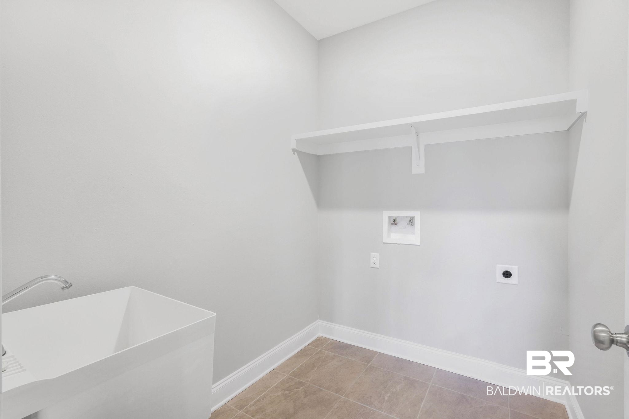 7781 Calverton Street Foley, AL 36535 - Photo 25 of 35 upgrade-laundry tub
