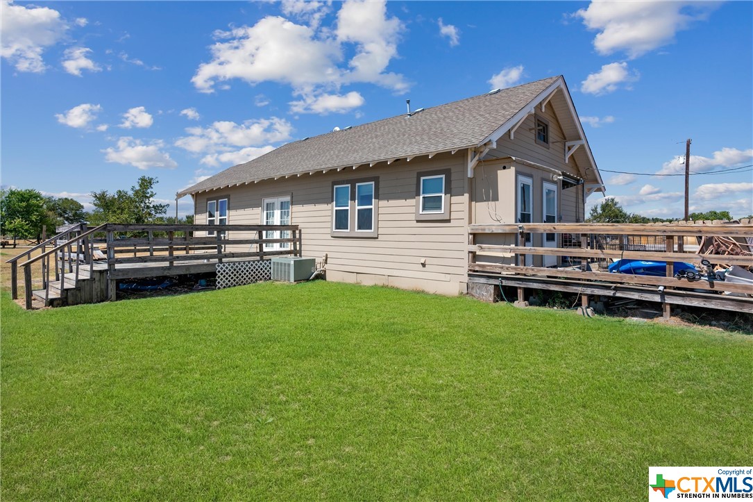 459 County Road 450 Thorndale, TX 76577 - Photo 11 of 34 a view of a house with a backyard