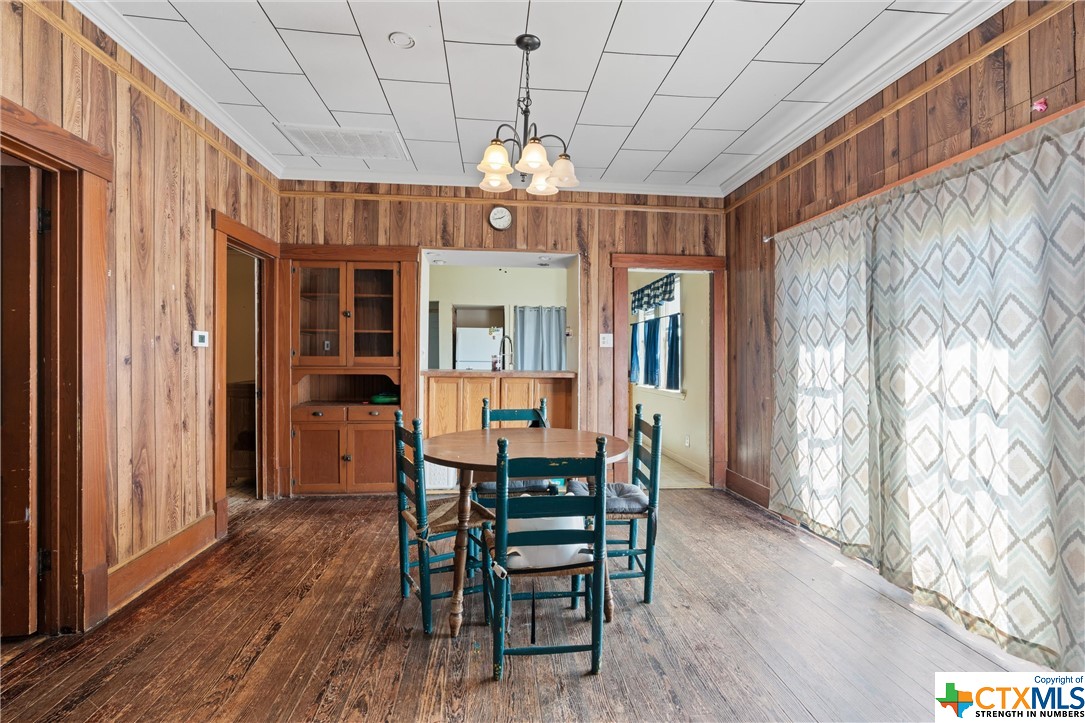 459 County Road 450 Thorndale, TX 76577 - Photo 16 of 34 a view of a dining room with furniture and chandelier