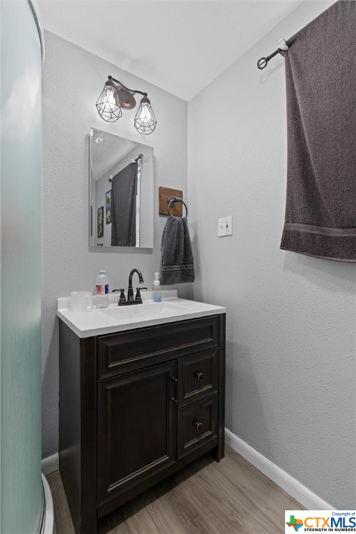 459 County Road 450 Thorndale, TX 76577 - Photo 34 of 34 a bathroom with a sink and a mirror