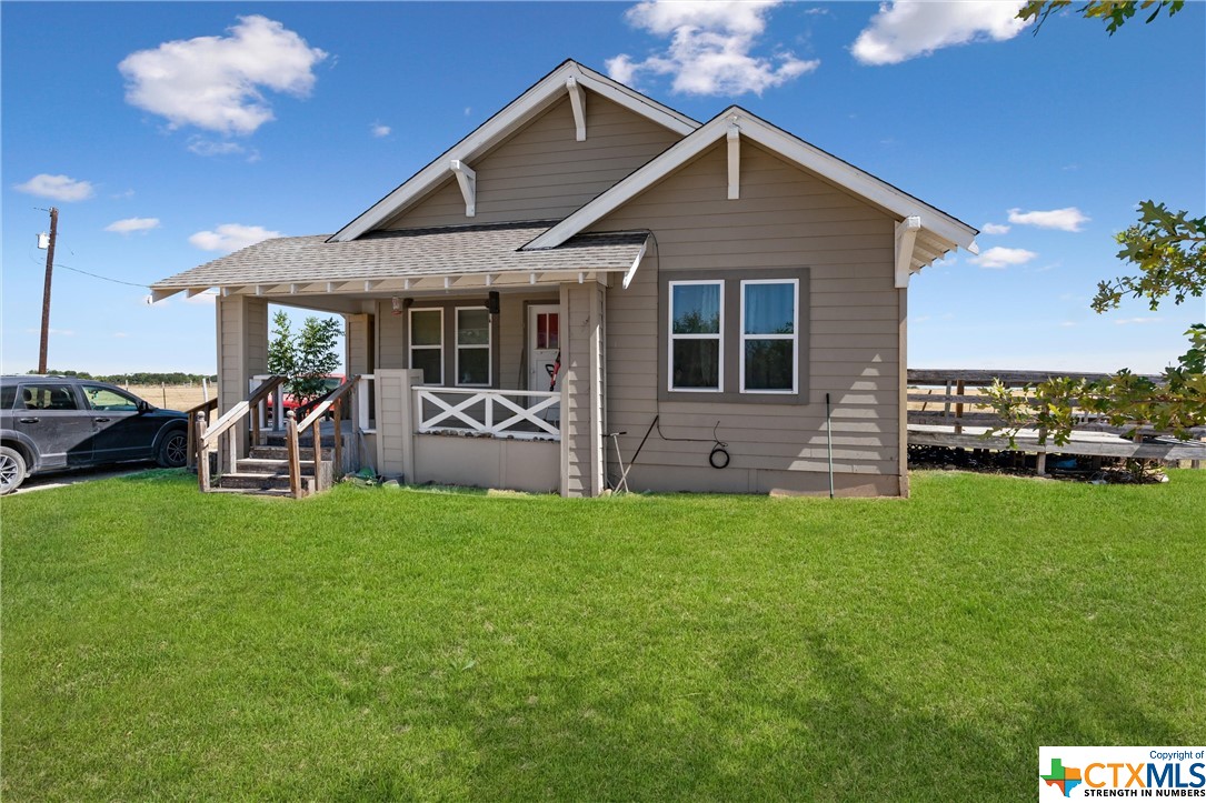 459 County Road 450 Thorndale, TX 76577 - Photo 8 of 34 a front view of a house with a yard