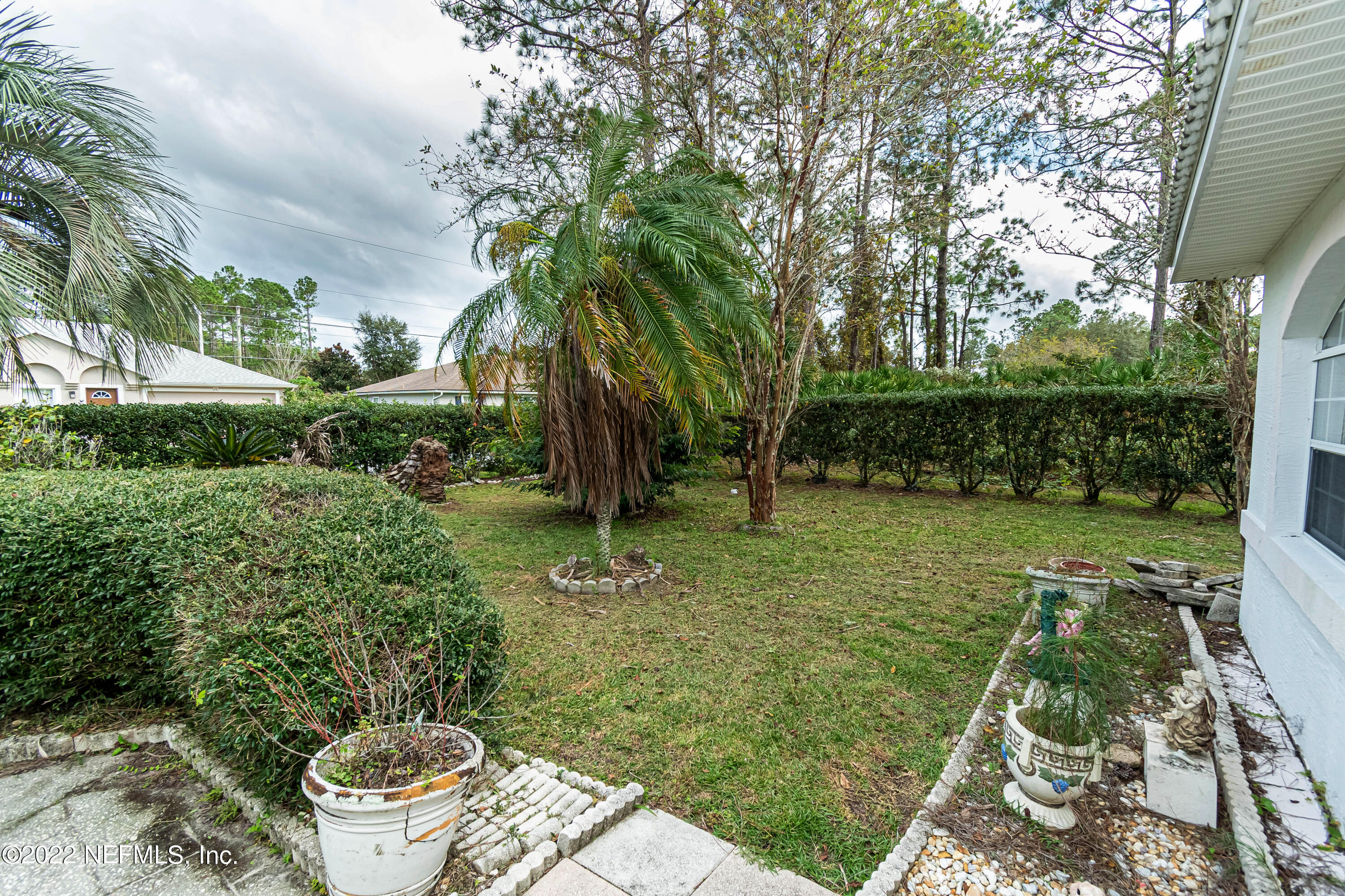 74 Raintree Place Palm Coast, FL 32164 - Photo 6 of 51 frontyard9