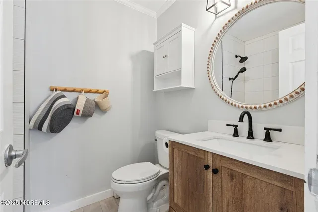 a bathroom with a sink and mirror