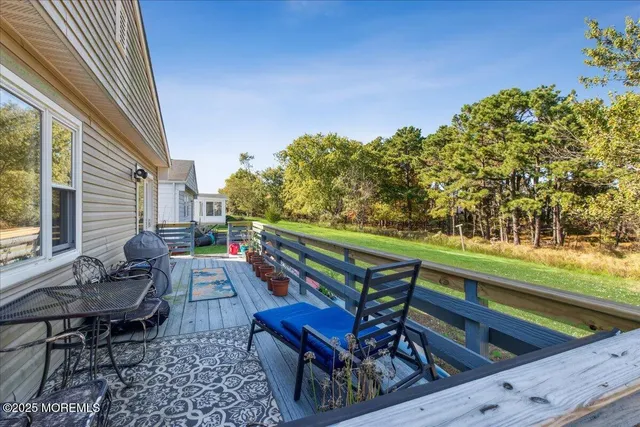 a sitting area with furniture and outdoor space