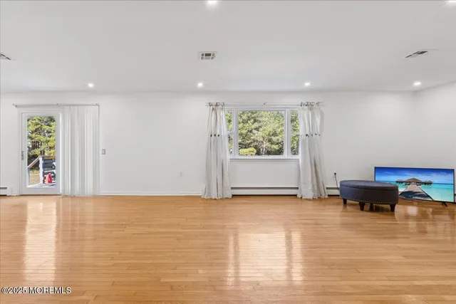 a view of livingroom with furniture and window