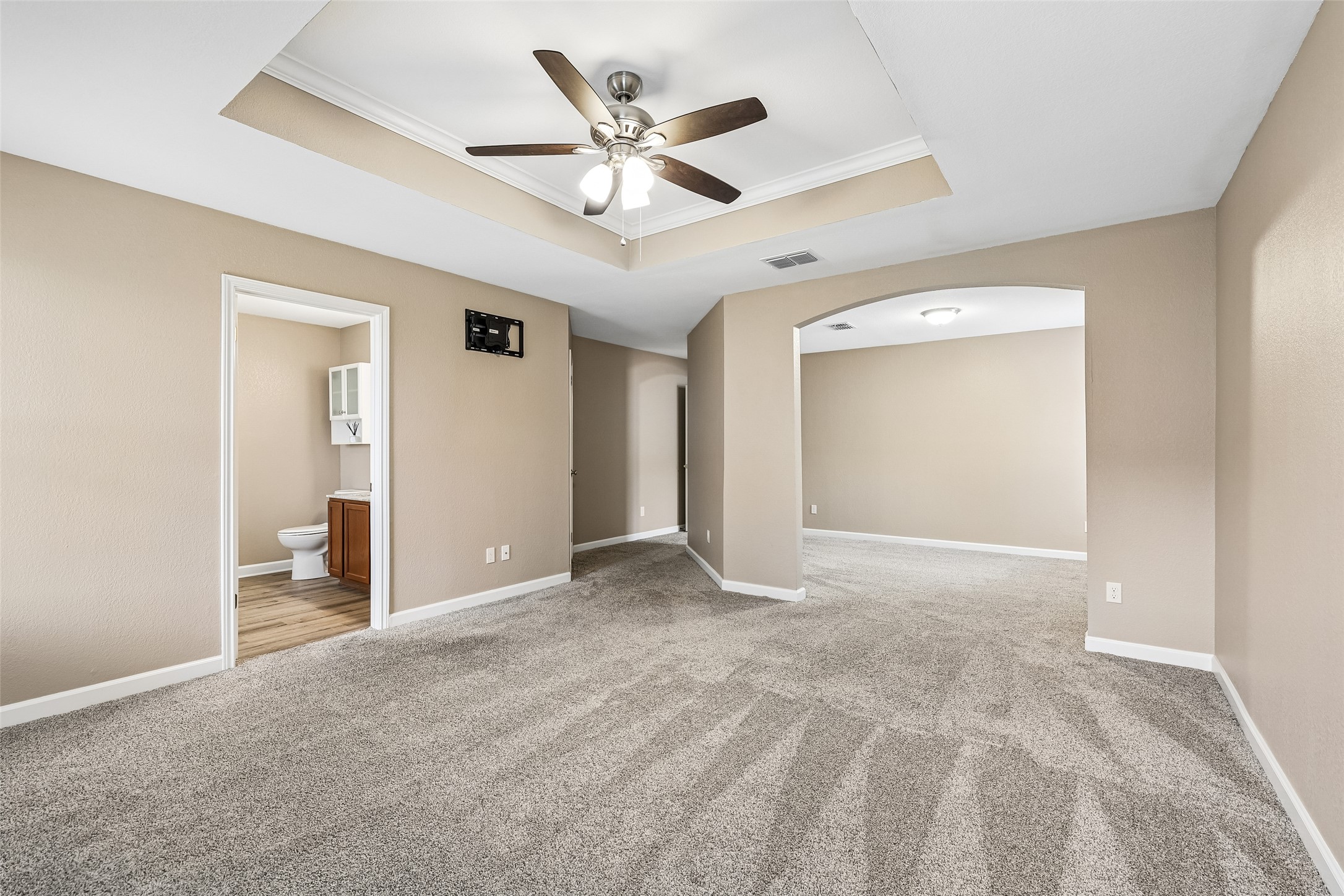 152 Grant Way Kyle, TX 78640 - Photo 23 of 39 a view of a livingroom with a ceiling fan & a ceiling fan