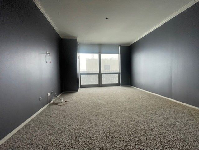 a bathroom with a granite countertop toilet sink and shower