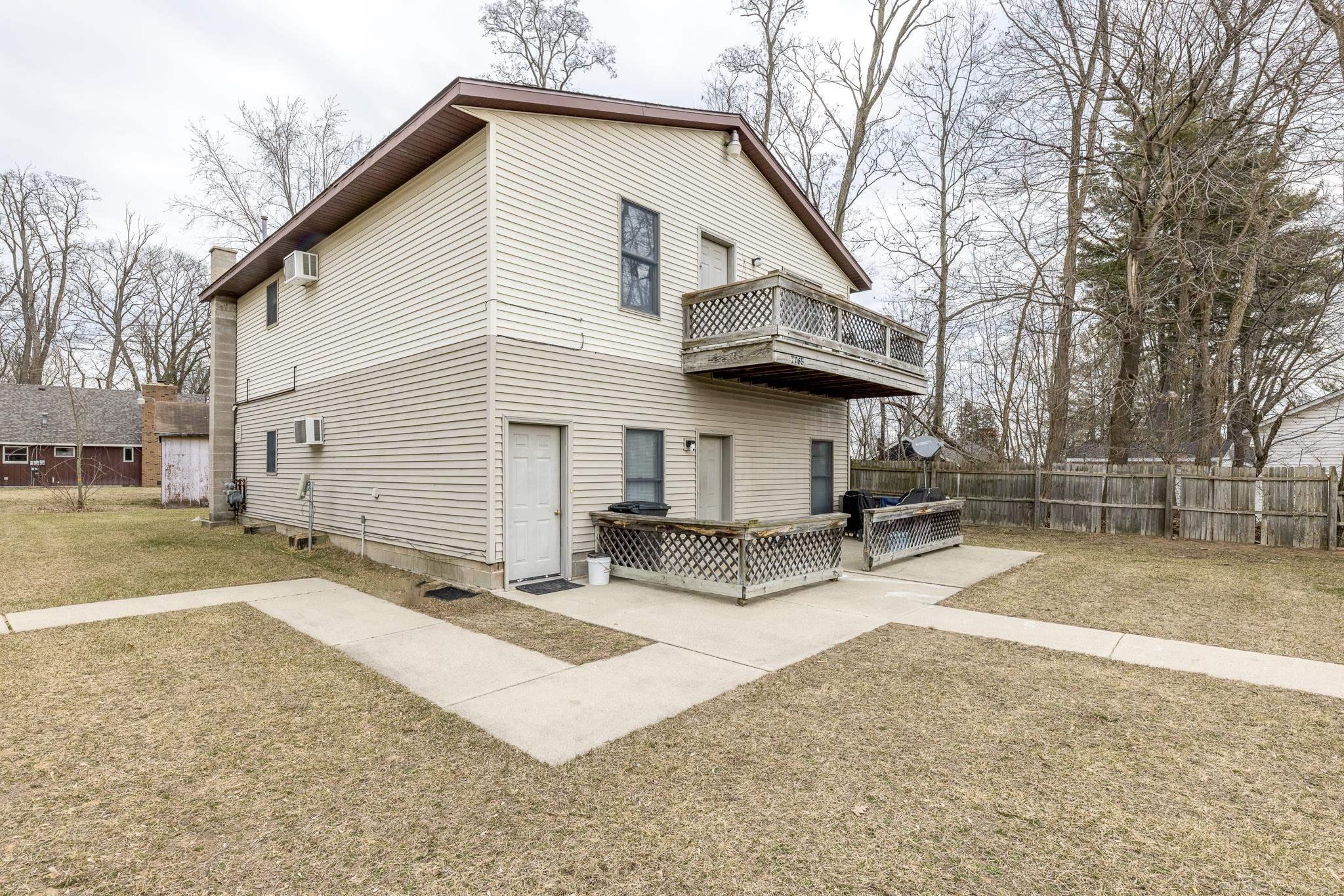 7765 Shorecliff Road Lexington, MI 48450 - Photo 2 of 26 Lake Access DUPLEX