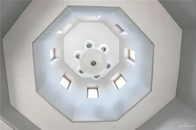 a bedroom with a bed and a cabinets