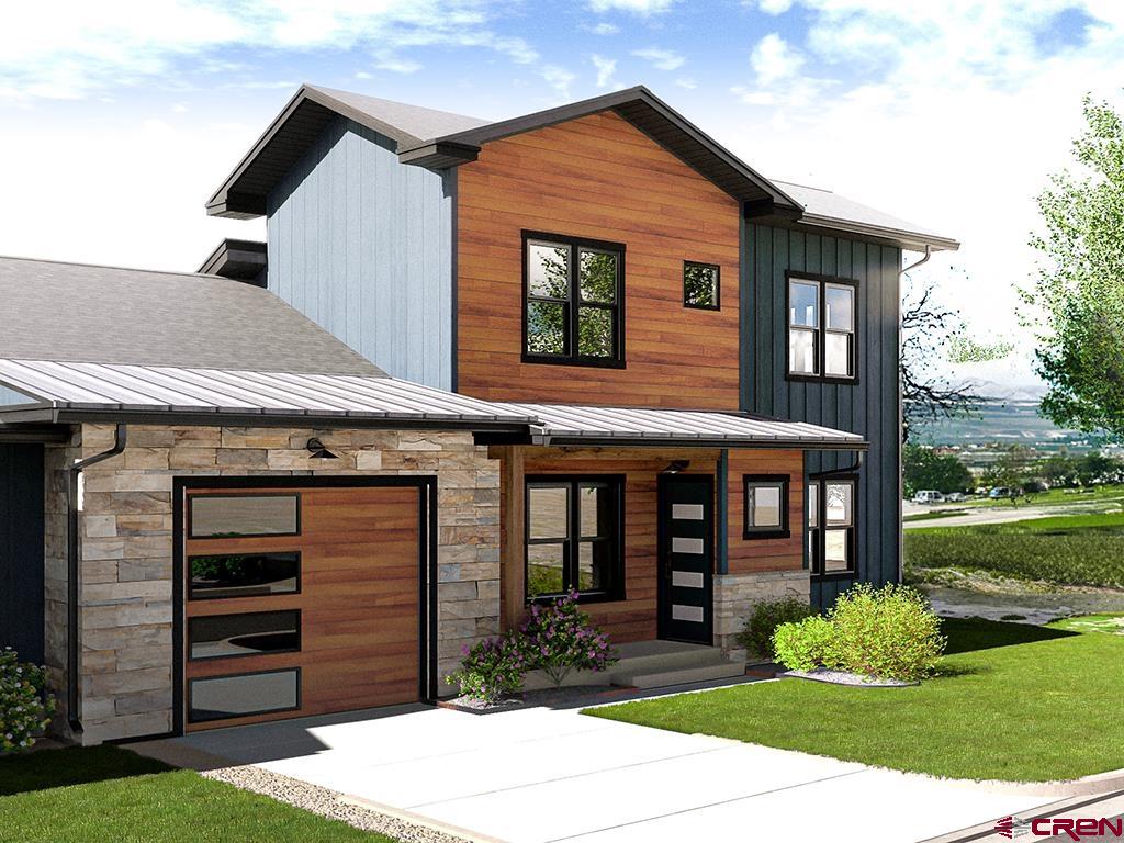 Trd Trd Rustic Row Montrose, CO 81401 - Photo 3 of 22 a front view of a house with garden