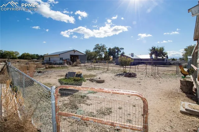 a view of a swimming pool with a terrace