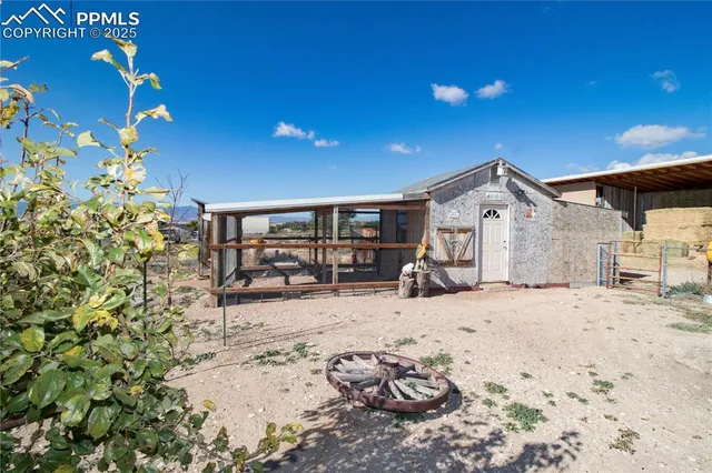 a view of a house with a snow in the yard
