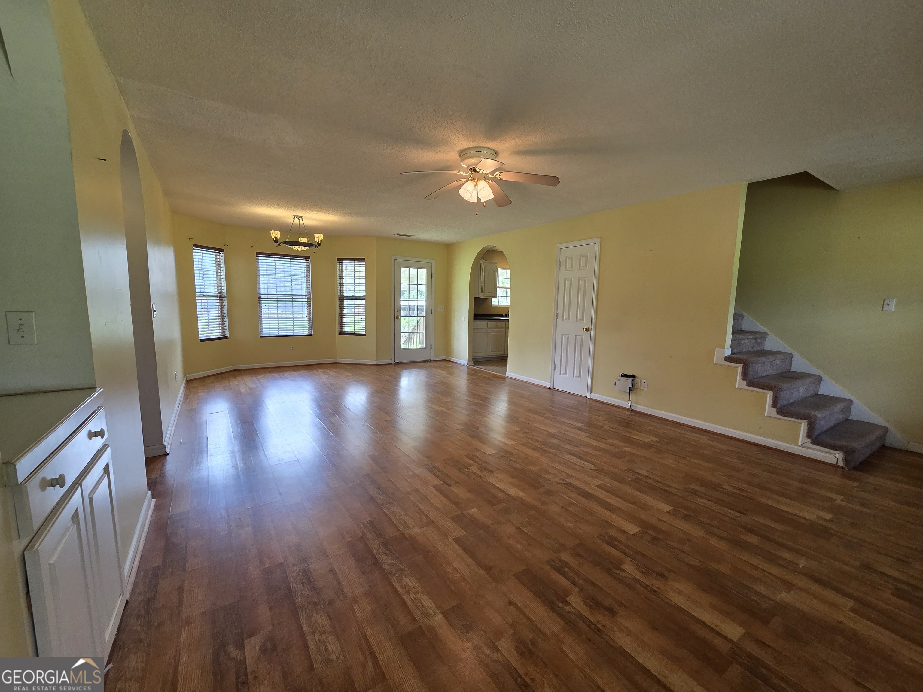 9546 Union Road Metter, GA 30439 - Photo 8 of 45 wooden floor in an empty room with a window